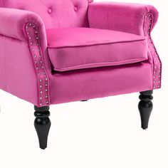 a pink chair with studded arms and legs