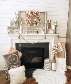 a living room filled with furniture and a fire place covered in fur rugs next to a fireplace