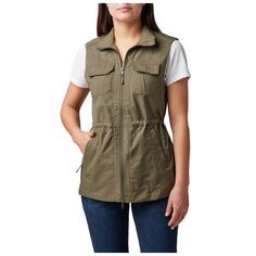 A tactical vest made from Flex-Tac® canvas for durable and stylish utility. The Yulia is finished with Teflon™ for stain resistance and has a drawcord at the waist for a slimmer fit and added warmth. 4 pockets are built-in to the front of the vest for your tools or gear. Imported. | 5.11 Tactical Women's Yulia Vest In Ranger Green | Size Small Utility Vest For Outdoor Work In Fall, Fall Utility Vest For Outdoor Work, Utility Cotton Vest With Multiple Pockets, Cotton Utility Vest For Outdoor Activities, Cotton Vest With Cargo Pockets For Outdoor Activities, Cotton Utility Vest With Side Pockets, Functional Cotton Utility Jacket With Side Pockets, Cotton Vest With Functional Pockets For Outdoor, Cotton Vest With Functional Pockets