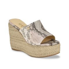 Guess-Evba Wedge Sandal Earn fashion reputation by sliding into the Guess Evba wedge sandal. Whether it's the two-tone hues, single-band design, or the jute-wrapped espadrille bottom, you'll feel special wearing this platform sandal. Chic Sandals With Textured Footbed And Wedge Heel, Espadrille Wedge Sandals With Textured Footbed, Chic Synthetic Espadrilles With Cushioned Footbed, Chic Beige Wedge Sandals With Cushioned Footbed, Beige Espadrille Wedge Sandals With Textured Footbed, Chic Synthetic Wedge Heel Espadrilles, Chic Summer Wedge Sandals With Textured Footbed, Natural Color Synthetic Wedge Heel Sandals, Chic Natural Color Synthetic Wedge Sandals