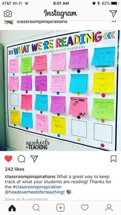 a bulletin board with post it notes on it