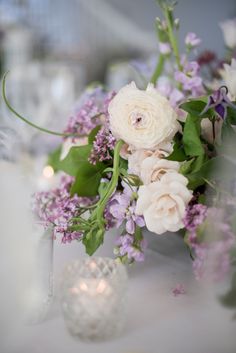 a bouquet of flowers sitting on top of a table