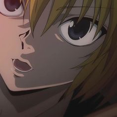 an anime character with blonde hair and big eyes looking at something in front of him