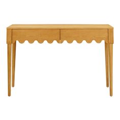 a wooden table with scalloped legs and a drawer on one side, against a white background