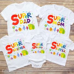 three baby onesuits with the words super dad and two children's onesuits