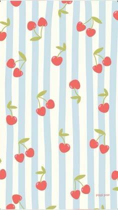 a blue and white striped wallpaper with cherries on it