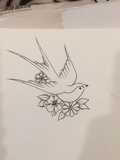 a drawing of a bird with flowers on it