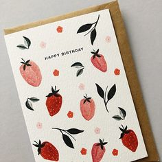 a birthday card with strawberries and leaves on it