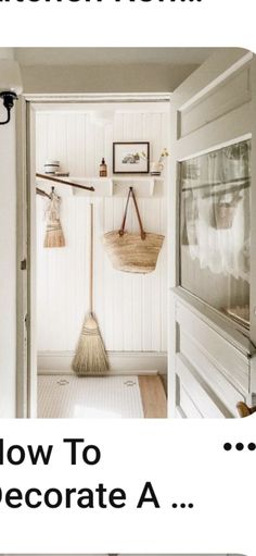 an open door leading into a room with brooms and other items on the wall