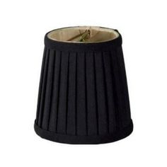 a black lamp shade on a white background