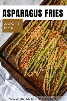 asparagus fries on a baking sheet with text overlay that reads, how to make asparagus fries low carb thins