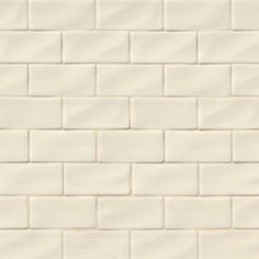 a white brick wall that is very close up