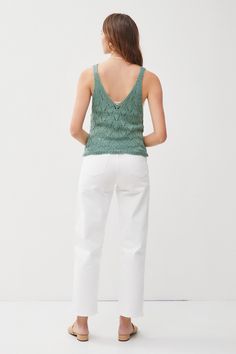 Get ready for some serious summer vibes with our Crochet Pointelle Sweater Top! This breezy, lightweight tank features a beautiful crochet and pointelle knit design, a deep V-neckline both in the front and back, and a relaxed fit for ultimate comfort. Perfect for any summer occasion, this top will keep you looking stylish and feeling cool. Pointelle Sweater, Pointelle Knit, Cami Crop Top, Shoe Gifts, Crop Top Blouse, Beautiful Crochet, New Arrival Dress, Denim Pant, Dress Romper