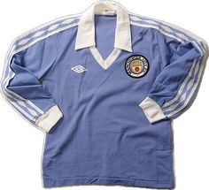 an old blue soccer jersey with white stripes