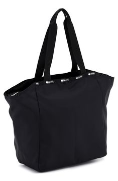 Get away with a smart and spacious tote bag designed with isolated zip pockets to stash worn gym gear or to keep items away from your delicates. Top zip closure Dual top handles Nylon Imported Nylon Travel Bag With Zipper Pocket For Gym, Functional Shoulder Gym Bag With Zipper, Gym Shoulder Travel Bag With Zipper Closure, Nylon Tote Travel Bag With Zipper Closure, Sporty Tote Shoulder Bag With Zipper Closure, Sporty Tote Travel Bag With Zipper Closure, Daily Use Tote Gym Bag With Functional Pockets, Sports Shoulder Travel Bag With Zipper Closure, Functional Gym Bag With Zipper Pocket For Daily Use