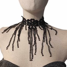 Romantic fringe lace choker  One size, adjustable (12 ")  If you need special size, small or large, please message me.  Fastens with silky cords on the back.  It is perfect to wear with corset, evening or with party dress, or a Festival costume accesories.  Find more accessories here in my shop : https://www.etsy.com/shop/HouseOfTooFan Please note that due to lighting effects, monitor's brightness, contrast and other settings, there might be some slight differences in the color tone/shade of the Handmade Adjustable Evening Choker, Adjustable Fringe Choker, Bohemian Black Necklace For Party, Elegant Beaded Choker For Festivals, Adjustable Beaded Choker For Evening, Elegant Adjustable Lace Choker, Black Fringe Jewelry For Festival, Adjustable Black Choker For Party, Adjustable Beaded Choker For Party