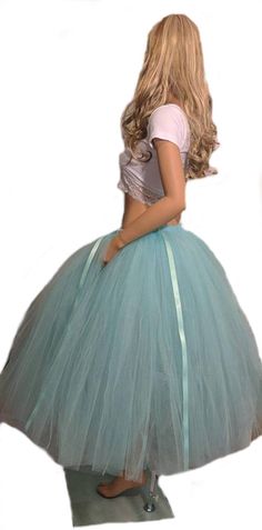 This full adult long tutu skirt is 33 inches long and is made by tying strips of tulle to a stretchy elastic waist band and comes with 5 double sided accent ribbons the go down the entire length of the skirt. The ribbon will be the same color as the tulle you chose. If you want more than one color leave your request in the message area at checkout and be sure to include the color of ribbon you want when choosing more than one color of tulle. An adult standard measuring guide is provided but it i Fitted Tulle Petticoat For Debutante Ball, Elegant Full Skirt Tulle Petticoat, Elegant Full Tulle Petticoat, Tulle Tutu Dress Ball Gown For Debutante Ball, Tulle Tutu Ball Gown For Debutante Ball, Debutante Ball Tulle Tutu Ball Gown, Fitted Tulle Skirt For Debutante Ball, Tulle Skirt Ball Gown For Debutante Ball, Debutante Ball Gown Tutu Dress