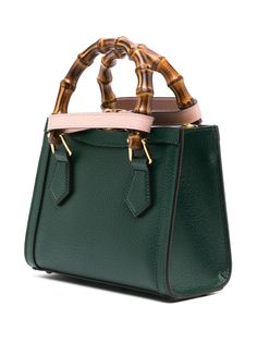 mini Diana tote bag from Gucci featuring racing green, calf leather, grained texture, signature Double G logo, strap detailing, magnetic fastening, adjustable detachable shoulder strap, signature bamboo top handles, internal zip-fastening pocket and main compartment. This item is in size UNI and the color is Green Green Gucci Bag With Detachable Handle, Gucci Crossbody Satchel With Top Carry Handle, Gucci Crossbody Satchel, Modern Gucci Satchel With Detachable Strap, Green Gucci Travel Bag, Gucci Green Bag With Detachable Strap, Green Gucci Bag With Detachable Strap, Gucci Green Satchel Bag, Gucci Leather Satchel With Handles