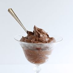 a glass bowl filled with chocolate ice cream