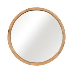 a round wooden mirror on a white background