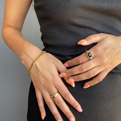 Black Stone Ring - Make a statement with this gorgeous black onyx twist ring. Perfect for any special occasion, this chunky statement piece features an intricate twist design featuring black obsidian stonework and a gold filled nontarnish finish. The perfect addition to your ever-growing collection of gothic jewelry. Details: Materials: Stainless Steel and 18k Gold Measurements: Face height 9.8mm Allergy Information: Hypoallergenic - Will not turn skin green - Style: Minimalist - Ships the next Trendy Gemstone Ring Jewelry, Trendy Gemstone Ring, Modern Black Enamel Ring Jewelry, Modern Black Enamel Ring, Black Minimalist Signet Ring For Everyday, Everyday Black Signet Ring With Polished Finish, Elegant Onyx Rings For Everyday Wear, Modern Black Enamel Open Ring Jewelry, Classic Black Jewelry For Everyday