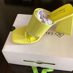 Never Worn Brand New Yellow Synthetic Mules With Round Toe, Yellow Casual Mules For Spring, Yellow Flat Mules For Spring, Trendy Yellow Mules For Summer, Yellow Open Toe Synthetic Mules, Yellow Beach Mules For Spring, Yellow Spring Beach Mules, Yellow Flat Mules For Summer, Yellow Open Toe Mules For Spring