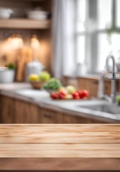 a wooden table top in front of a kitchen sink