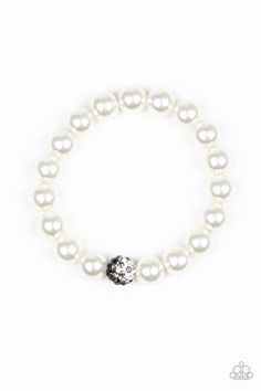 Pearly white beads are threaded along a stretchy band around the wrist. Radiating with white, black, and smoky rhinestones, a black and white bead adorns the center for a refined flair. Sold as one individual bracelet. White Bracelet, White Bracelets, Paparazzi Accessories, Rhinestone Bracelet, Paparazzi Jewelry, White Beads, Pearl Bracelet, Stretch Bracelets, Pearl White