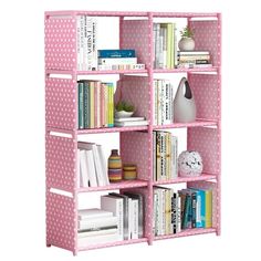 three pink shelves with books and vases on top of each shelf in front of a white background