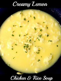 creamy lemon chicken and rice soup in a black bowl with parsley on the side