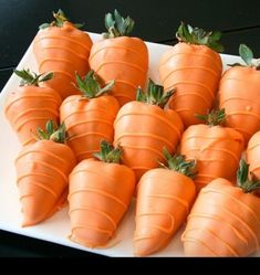 a white plate topped with lots of cut up carrots