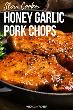 slow cooker honey garlic pork chops in a skillet with parsley on the side