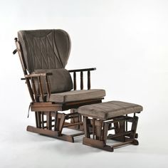 an old rocking chair and footstool are sitting side by side on a white background