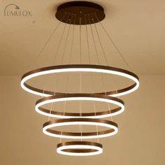 a circular light fixture hanging from the ceiling