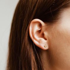 Our North Star stud earring - a tiny little starburst that guides you where you need to go.  Wear it as a reminder to follow your true path - and share it with the person in your life who is brave enough to listen to their heart. Wear it solo, or team it with our Pave Moon Studs for a dose of intuition or our Pave Lightning Studs for a bolt of inspiration.  One earring, infinite possibilities of  ear party piercings or even ear cuff no piercing and more ear cuff earings trends! Tragus Jewelry, Cartilage Piercings, Gold Jewelry Gift, Casual Earrings, Brave Enough