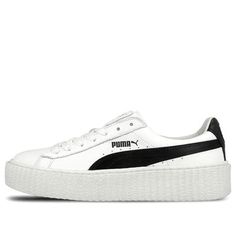 The Puma Fenty x Womens WMNS Creeper 'White Leather' is the perfect sneaker for any occasion. The upper is crafted from premium white leather, with a black Puma stripe and heel for a touch of contrast. The 1.5-inch white gum sole gives the shoe a chunky look, while the metallic gold branding on the tongue adds a touch of luxury. Whether you're dressing up or dressing down, this sneaker is sure to elevate your look. (SNKR/Skate/Light/Low Top) Puma Fenty, Perfect Sneakers, White Puma, Black Puma, Fenty Puma, Gold Branding, Creepers, Elevate Your Look, Dressed Down