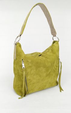 "This is Shayan hobo bag from suede Italian leather with a unique soft surface in light warm green color (pistachio) Shayan hobo bag is highly functional, providing you with plenty of space to carry your essentials around with ease. Dimensions: Height - 26 cm ( 10.24 \") Width - 27 cm ( 10.63 \") Depth- 12 cm ( 4.72 \") (depth is measured across bottom of backpack) Key features: * The sturdy zip closure ensures that your belongings remain safe, whether you're at work or traveling. * A large fron Suede Hobo Bag With Zipper For Daily Use, Suede Hobo Bag For Daily Use, Suede Hobo Bag With Zipper Closure For Daily Use, Green Hobo Bag With Removable Pouch, Green Suede Bags For Everyday Use, Green Suede Shoulder Bag For Everyday Use, Suede Hobo Shoulder Bag With Zipper, Green Hobo Shoulder Bag With Zipper, Suede Hobo Shoulder Bag With Zipper Closure