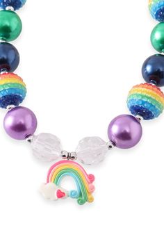 New! Match all your little one's clothing with our Rainbow chunky necklace featuring a Rainbow, cloud and heart pendant design. Fun and bright colors will jazz up her tees and dresses. Makes the perfect accessory for a Rainbow themed Birthday party. Makes a cute gift for her. Length: 15“ Material: High quality ABS pearls and rhinestones Match with other Rainbow styles here. SKU: 000263 Cute Personalized Multicolor Charm Necklaces, Novelty Multicolor Jewelry For Birthday, Playful Multicolor Personalized Charm Necklaces, Playful Personalized Multicolor Charm Necklaces, Personalized Multicolor Playful Charm Necklaces, Rainbow Novelty Jewelry For Birthday, Fun Multicolor Personalized Charm Necklaces, Cute Multicolor Charm Necklace For Birthday, Cute Multicolor Necklace For Birthday