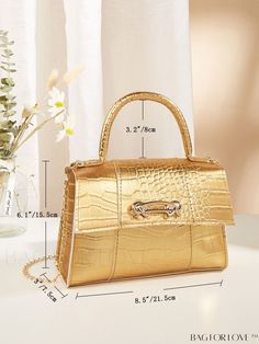 BagForLove - Square Bag with Metallic Crocodile Embossed Design Product Description Color Gold Magnetic Yes Type Square Bag Bag Size Small Strap Type Top Handle Pattern Type Crocodile Print Closure Type Magnet Style Fashionable Coating 100% Polyurethane Composition 100% Polyester Material PU Leather Size Chart INCH CM Strap Length Bag Length Bag Width Bag Height Handle Height 47.2 inch 8.5 inch 3 inch 6.1 inch 3.1 inch Strap Length Bag Length Bag Width Bag Height Handle Height 120 cm 21.5 cm 7.5 Chic Gold Bag With Crocodile Pattern, Gold Crocodile Pattern Satchel Bag, Trendy Gold Bags With Adjustable Handle, Gold Party Bag With Crocodile Pattern, Gold Satchel With Adjustable Double Handle, Gold Crocodile Pattern Party Bag, Gold Double Handle Satchel With Adjustable Handle, Gold Crocodile Pattern Shoulder Bag For Daily Use, Gold Crocodile Pattern Shoulder Bag For Evening