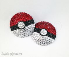 pair of red and black sequinized pokeballs