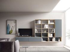 a living room filled with furniture and a flat screen tv on top of a wooden shelf