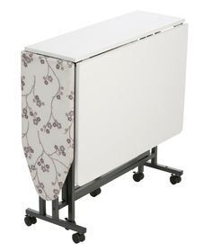 a white cabinet sitting on wheels with an ironing board attached to the back of it