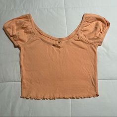 Pacsun Short Sleeve Top Brand New!!! Never Been Worn Color: Orange/Peach Size: Small Summer Crop Top With Short Sleeves For Day Out, Trendy Apricot Tops For Spring, Casual Short Sleeve Crop Top For Beach, Casual Apricot Tops For Summer, Apricot Tops For Day Out In Spring, Fitted Peach Summer Tops, Apricot Tops For Spring Day Out, Spring Apricot Tops For Day Out, Casual Spring Tops For Warm Weather