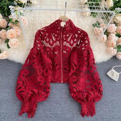 Elegant Red Lace Hollow Out Lantern Long Sleeve Stand Collar Loose Blouse TopItem Measurements(cm) One Size:Length:50 Sleeve:53 Bust:114 Waist:90 Note:Measurements may exist 1-3 cm errors due to manual measuring. 1 inch=2.54 cm. Lace Lanterns, Short Blouse, Stand Collar Shirt, Lantern Sleeved Blouses, Short Blouses, Blouse Casual, Elegant Red, Loose Blouse, Looks Chic