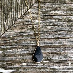 This delicate black stone necklace is the epitome of understated beauty. The pendant necklace is comprised of a genuine volcanic Obsidian stone and a beautiful chain in the length of your choice: 16 inch, 18 inch or 20 inch. The chain is dainty and delicate, making this a lovely piece for those that love modern, simple, and minimalist jewelry. As your finish, choose either Sterling Silver 925 or 14K Gold fill. The small and lightweight Obsidian is cut in a lovely teardrop shape and is expertly w Obsidian Gemstone Necklace For Gift, Obsidian Jewelry Necklaces, Obsidian Crystal Necklace, Silver Obsidian Necklaces, Black Obsidian Jewelry, Ankle Bracelets Boho, Black Obsidian Necklace, Pastel Bracelet, Obsidian Jewelry