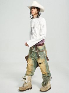 The Acid-Washed Ripped Flare Jeans are a bold fusion of retro design and modern craftsmanship. With an eye-catching acid-wash finish and yellow spray-stain effect, these jeans deliver an edgy, vintage-inspired look. The ripped and distressed detailing adds a rebellious touch, while the flared silhouette offers a standout style. Featuring two front and two back pockets, these jeans are made from premium 100% cotton and provide a slightly oversized fit for added comfort and flair. Acid-wash finish Urban Acid Wash Bottoms For Fall, Distressed Bottoms For Fall Festival, Stonewashed Jeans For Fall Streetwear, Urban Acid Wash Jeans For Fall, Faded Distressed Streetwear Jeans, Distressed Faded Bottoms For Streetwear, Distressed Hip Hop Jeans For Fall, Edgy Acid Wash Bottoms For Streetwear, Acid Wash Grunge Bottoms For Streetwear