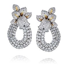 Transform your style into a blooming masterpiece with our exquisite 18K Two Tone 13 carat Diamond Statement Flower Earrings! Brace yourself for the spotlight as these captivating earrings take center stage. Crafted with meticulous attention to detail, these earrings feature a stunning array of round diamonds set in lustrous 18K gold. Their impressive size and brilliant sparkle are bound to make heads turn and hearts skip a beat.With a centerpiece of 13 carats, these flower earrings embody sheer Luxury Flower Shaped Diamond Earrings, Luxury Flower Shaped Diamond Earrings With Accents, Luxury Flower-shaped Diamond Earrings With Accents, Luxury Diamond Cluster Earrings In Flower Shape, Luxury Brilliant Cut Flower Earrings For Formal Occasions, Luxury Flower Earrings With Brilliant Cut For Formal Occasions, Luxury Flower Earrings With Brilliant Cut For Formal Events, Luxury Flower Shaped Cluster Earrings For Formal Occasions, Luxury Flower Shaped Cluster Earrings For Formal Events