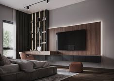 a modern living room with a large tv on the wall