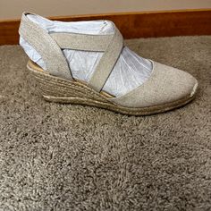 Brand New In Box- Easy Spirit Women's Meza Casual Strappy Espadrille Wedges Sandal That Are A Medium Natural Color With Gold Textile Ie Tan Fabric With Subtle Gold Thread- Difficult To See In Photos. Very Lightweight, Flexible And Comfortable. Never Worn. 2.76" Heel, 0.98" Platform Height Shoe Width- Medium Slip-On Closure Cushioned Footbed, Arch Support Seude And Textile Or Textile Upper, Textile Lining, Sole- Manmade Round And Closed Toe Beige Closed Toe Wedge Sandals Medium Width, Beige Closed Toe Medium Width Wedge Sandals, Beige Closed Toe Wedge Sandals, Beige High Heel Wedge Sandals Medium Width, Beige Medium Width Wedge Sandals With Round Toe, Beige Closed Toe Wedge Sandals With Cushioned Footbed, Wedges Shoes Low, Wedge Dress Shoes, Memory Foam Shoes