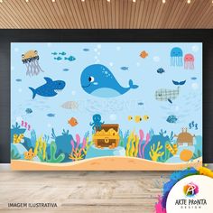 an underwater scene with blue whale and other animals on the wall, in front of a wooden